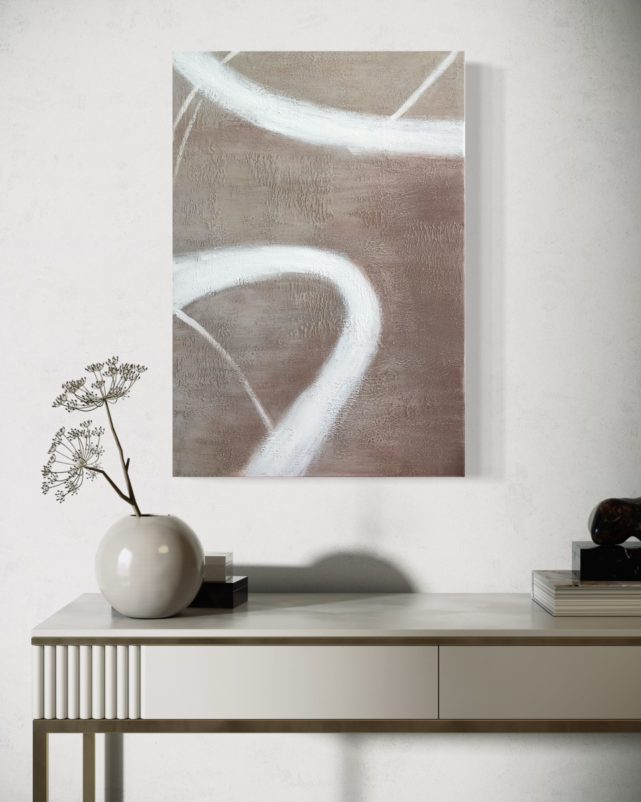 A simple abstract painting in earthy tones.